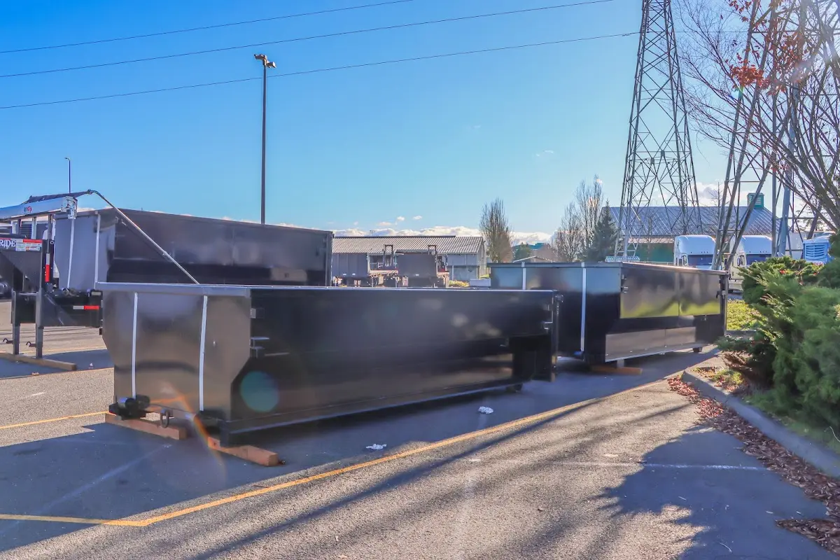 Roll-off dumpster ready for waste disposal at job site for 12 Yard Dumpster Rental in Perry